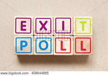 Color Letter Block In Word Exit Poll On Wood Background