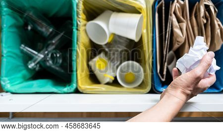 Recycling Concept - Female Sorts Of Plastic, Glass And Paper