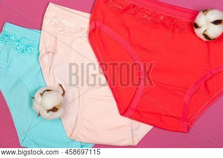 Clothes For Children In The Form Of Panties On A Pink Background. Clothes For Children From Soft Fab