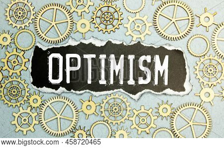 Optimism Word Written In Wooden Cube, Concept