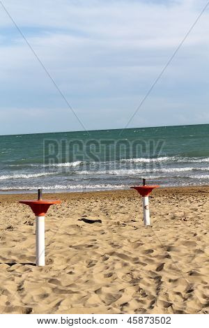 Umbrella Stand On The Beach