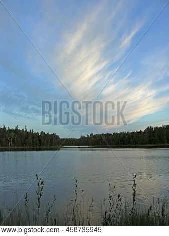 Beautiful Clouds Over The River Reach. Keret River, Karelia, Russia. Sunny Day In July.