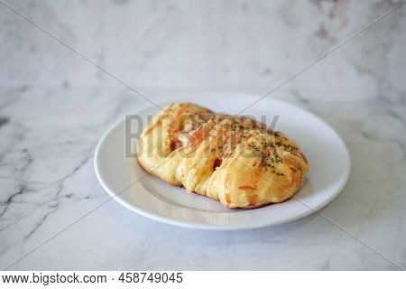 Sausage Buns Bread. Soft Baked Bun (dough) Stuffed With Sausage For Fast Food Breakfast Or Coffee Br