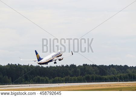 Ryanair Boeing 737-8as Takes Off From The Runway At Riga International Airport. Riga International A