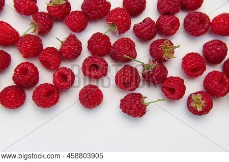 Ripe Juicy Fresh Raspberries On White Background Flat Lay Top View. Raspberry Pattern. Organic Raspb