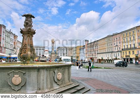 Linz, Austria - August 5, 2008: People Visit The Main Square Hauptplatz In Linz, Austria. It Is The 