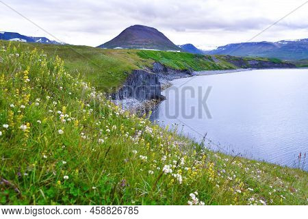 Northern Coast Of Iceland On The Atlantic Ocean And Natural Landscape With Mountains