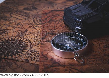 Tourist Travel By Car. Travel By Car. Compass And Car. Autotourism. Traveling Across Countries By La