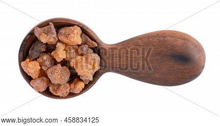 Myrrh Resin In Wooden Spoon, Isolated On White Background. Pile Of Natural Commiphora Myrrha. Sweet 