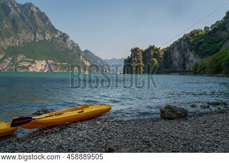 Nice Panorama Of The Iseo Lake And Yellow Kayak Docked On The Shore, Baia Del Bogn, Bergamo,italy