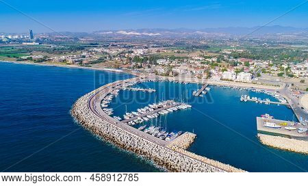 Aerial Bird's Eye View Of Zygi Fishing Village Port, Larnaca, Cyprus. The Fish Boats Moored In The H