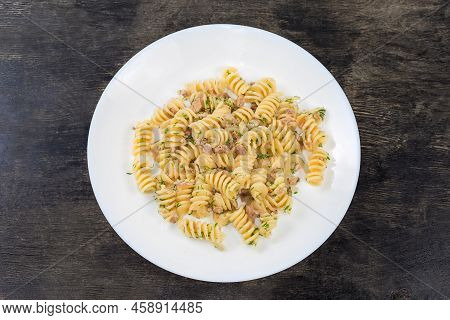 Prepared Spiral Pasta, Also Known As Fusilli Or Rotini Pasta Mixed With Stuffing Of Boiled Chopped P