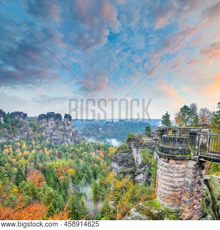 Picturesque Autumn Landscape In Saxon Switzerland National Park And  Bastei Bridge.   Location: Lohm