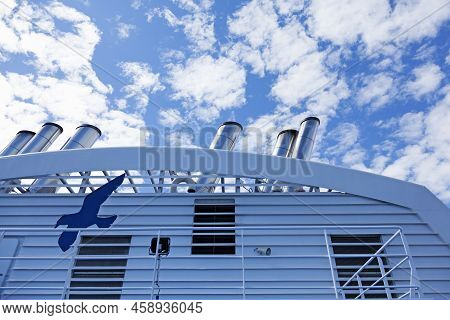 Vaasa, Finland - June 20, 2022: Chimneys On The Large Passenger Ferry In The Background A Beautiful 