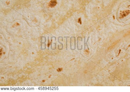 Plain Wheat Tortilla Wraps. Spanish Or Mexican Circular Unleavened Flatbread From Wheat Flour. Ingre