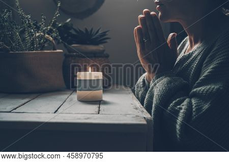 Concept Of Inner Life Balance And Meditation With Woman Praying With Clasped Hands In Front Of A Fir