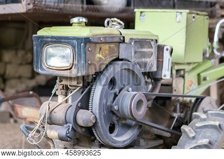 Typical Heavy Diesel Walking Tractor With Trailer. Agricultural Transport Equipment Of The Countrysi