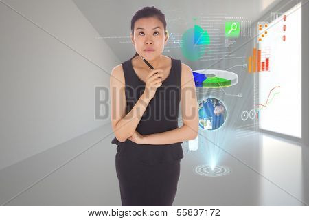 Thoughtful businesswoman against closed and open doors in sky
