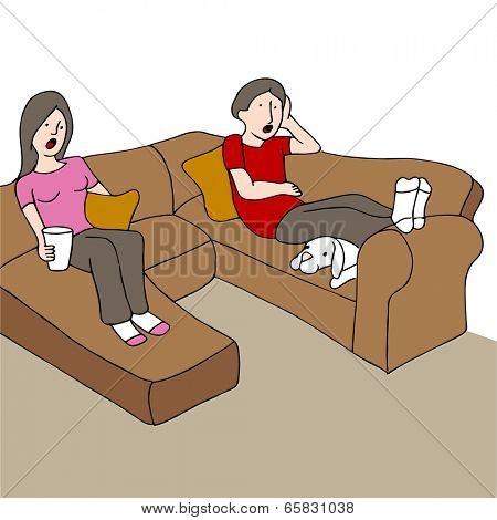 An image of a couple sitting on a couch with a surprised look on their faces while watching tv.