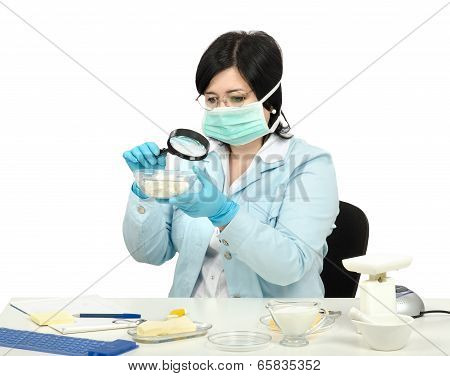 Expert Viewing Closely A Cottage Cheese In Laboratory