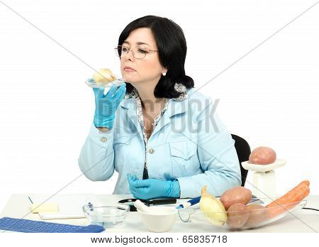 Expert Smelling Onion In Laboratory
