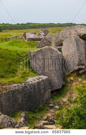 Old Broken German Bunkers Of Atlantic Wall On Pointe-du-hoc. Western End Of The Omaha Beach Sector,