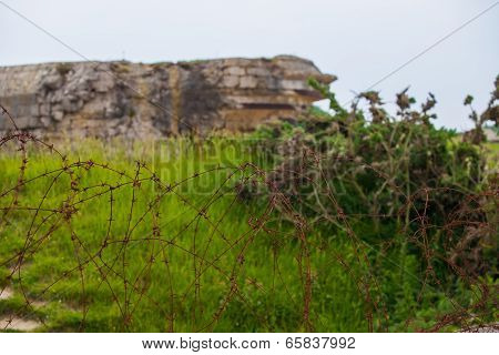 Old Broken German Bunkers Of Atlantic Wall On Pointe-du-hoc. Western End Of The Omaha Beach Sector,