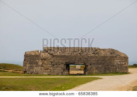 Old Broken German Bunkers Of Atlantic Wall On Pointe-du-hoc. Western End Of The Omaha Beach Sector,