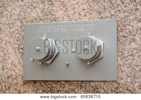 Auto Sprinkler Standpipe On Marble Wall