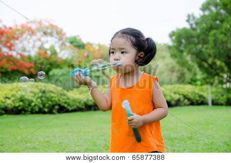 Asian Baby Girl Playing Bubble