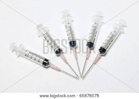 Medical Syringe in row