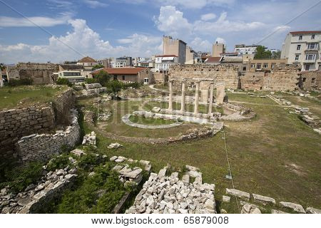 ATHENS, GREECE - MAY 10, 2014: Ruins in Athens in center of city. Tourism is a decisive sector of hope for Greek economy - In the year Greece receives about 18 million tourists.