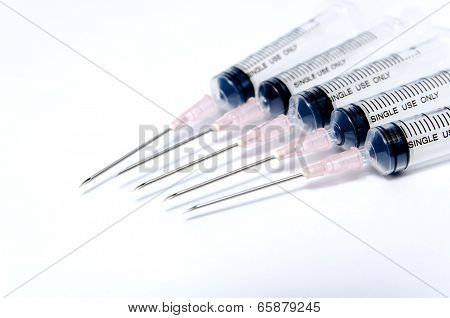 Medical Syringe in row
