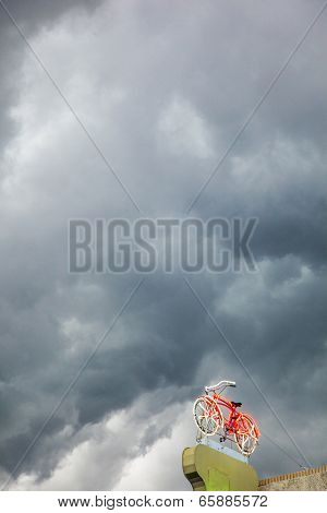 Neon Bicycle Under Dark Sky