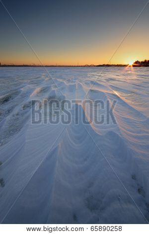 Sunrise On The Frozen River
