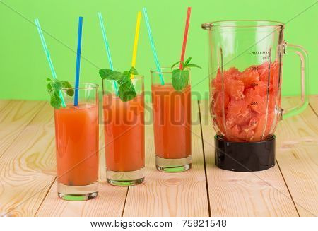 Grapefruit juice on table.
