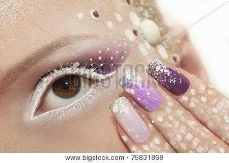 Snow makeup and manicure.