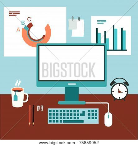 office desk with computer and graphics illustration