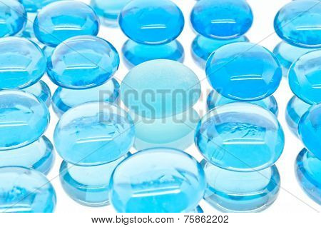 Collection Of Glossy Blue Glass Jewels And One Matte
