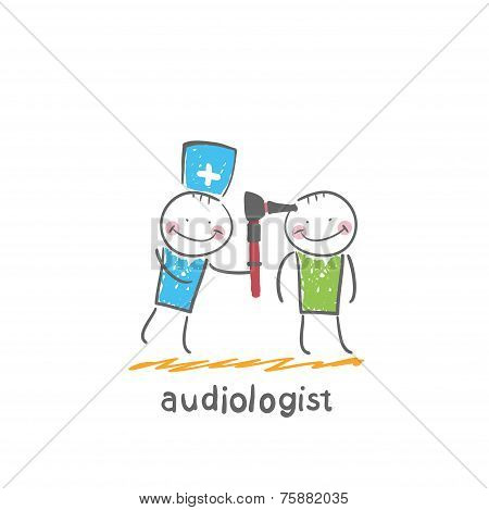 otolaryngologist examines the ear of the patient