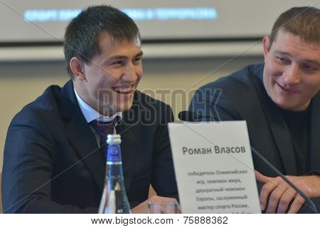 NOVOSIBIRSK, RUSSIA - NOVEMBER 7, 2014: Olympic and World champion in greco-roman wrestling Roman Vlasov on the press-conference before the Friendship Cup. The competitions start on November 8