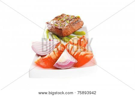 beef meat served with tomato on white porcelain