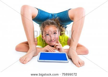 Flexible contortionist kid girl thinking gesture with tablet pc on white background