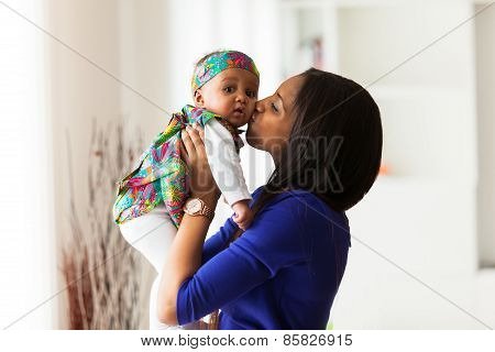 Young African American Mother Playing With Her Baby Girl