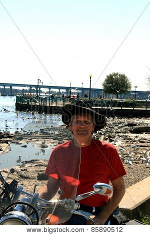 Elderly Man Sitting on His MotorcycleS615