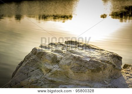 Rock by a lake