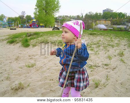 Little girl playing in nature