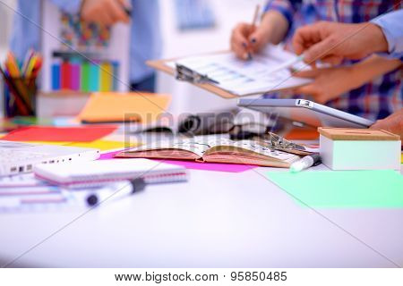 Young business people working at office on new project