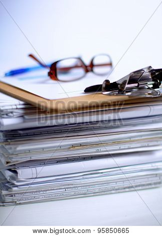 Big stack of papers ,documents on the desk