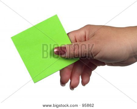 Hand som håller papper